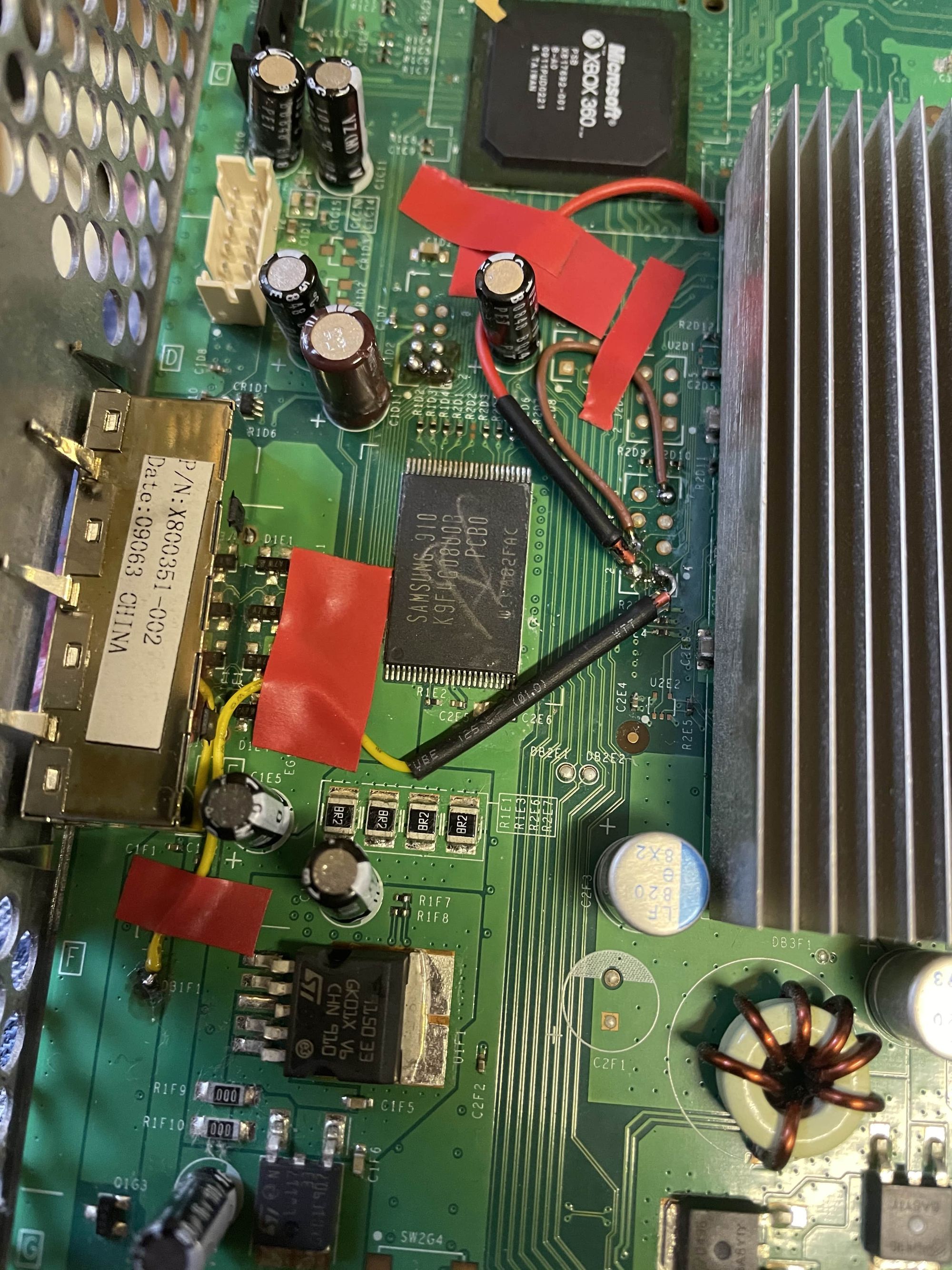 An image of a Jasper motherboard with the JTAG hack installed.